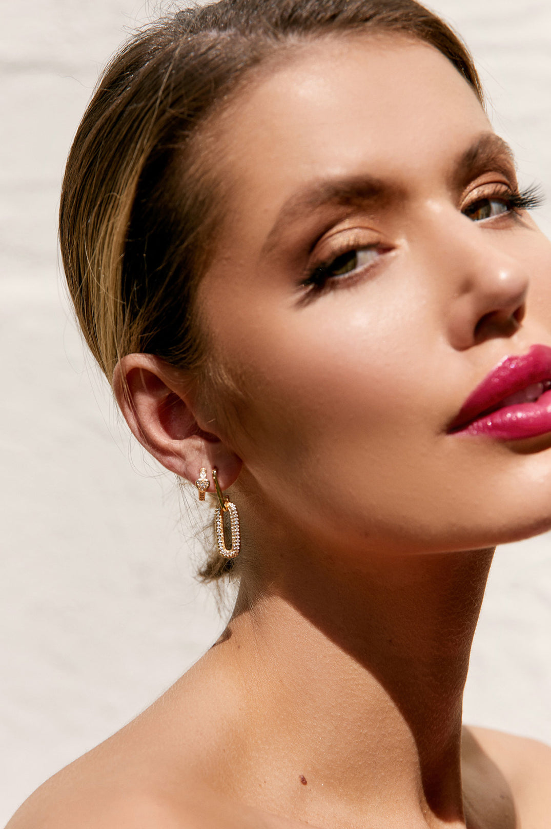 Diamante Heart Mini Hoop Earrings available in Gold Crystal and Silver Crystal.