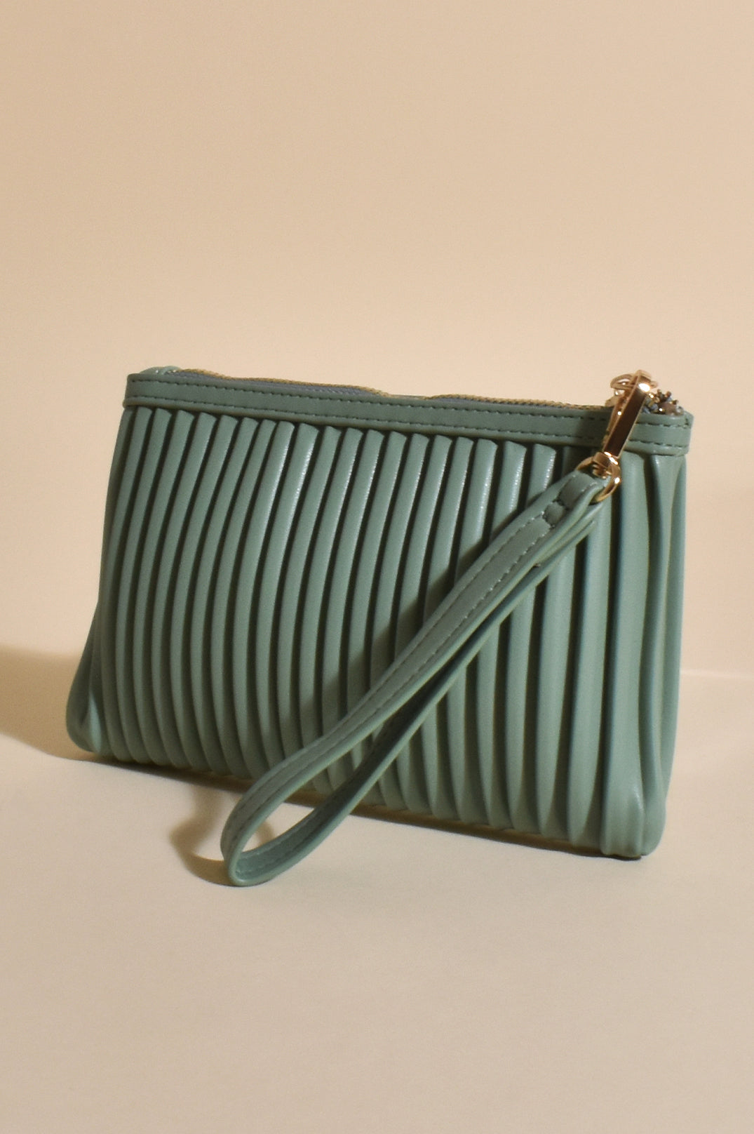 Amara Pleat Design Pouch Bag with Wrist Strap in Tan or Sage.
