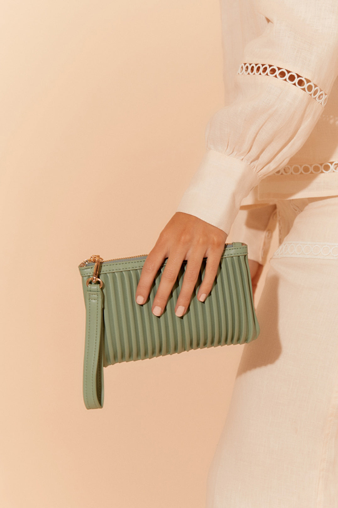 Amara Pleat Design Pouch Bag with Wrist Strap in Tan or Sage.
