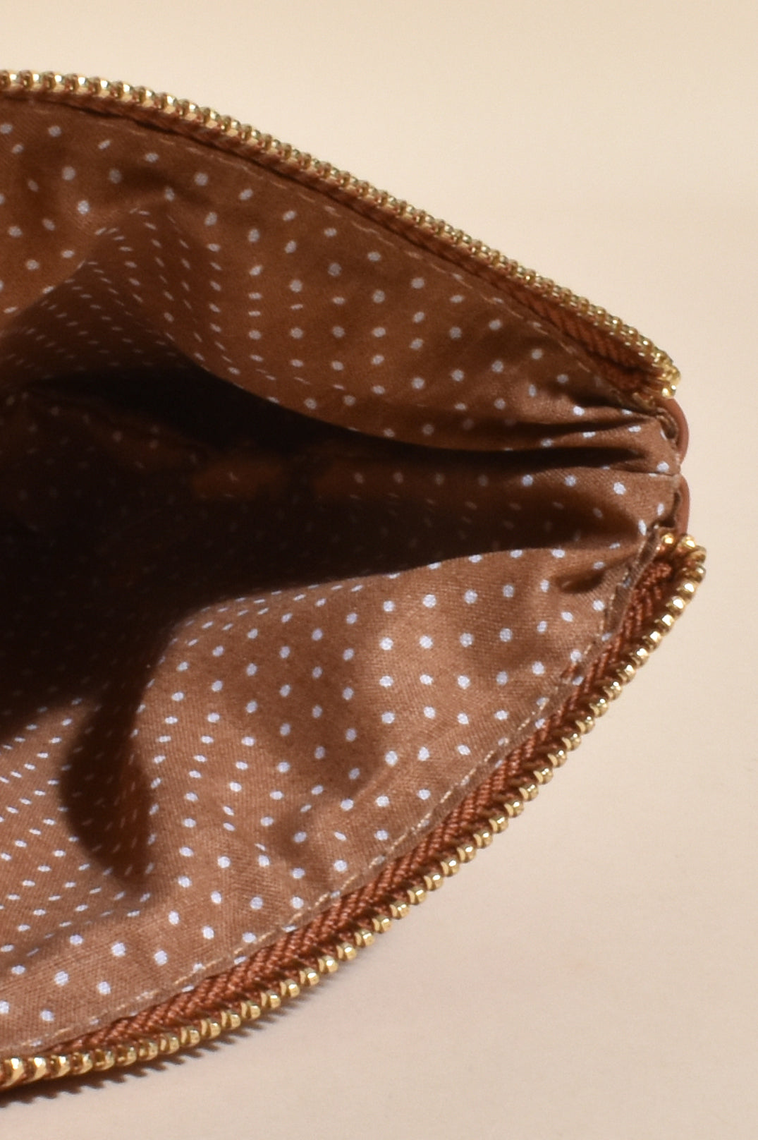 Amara Pleat Design Pouch Bag with Wrist Strap in Tan or Sage.