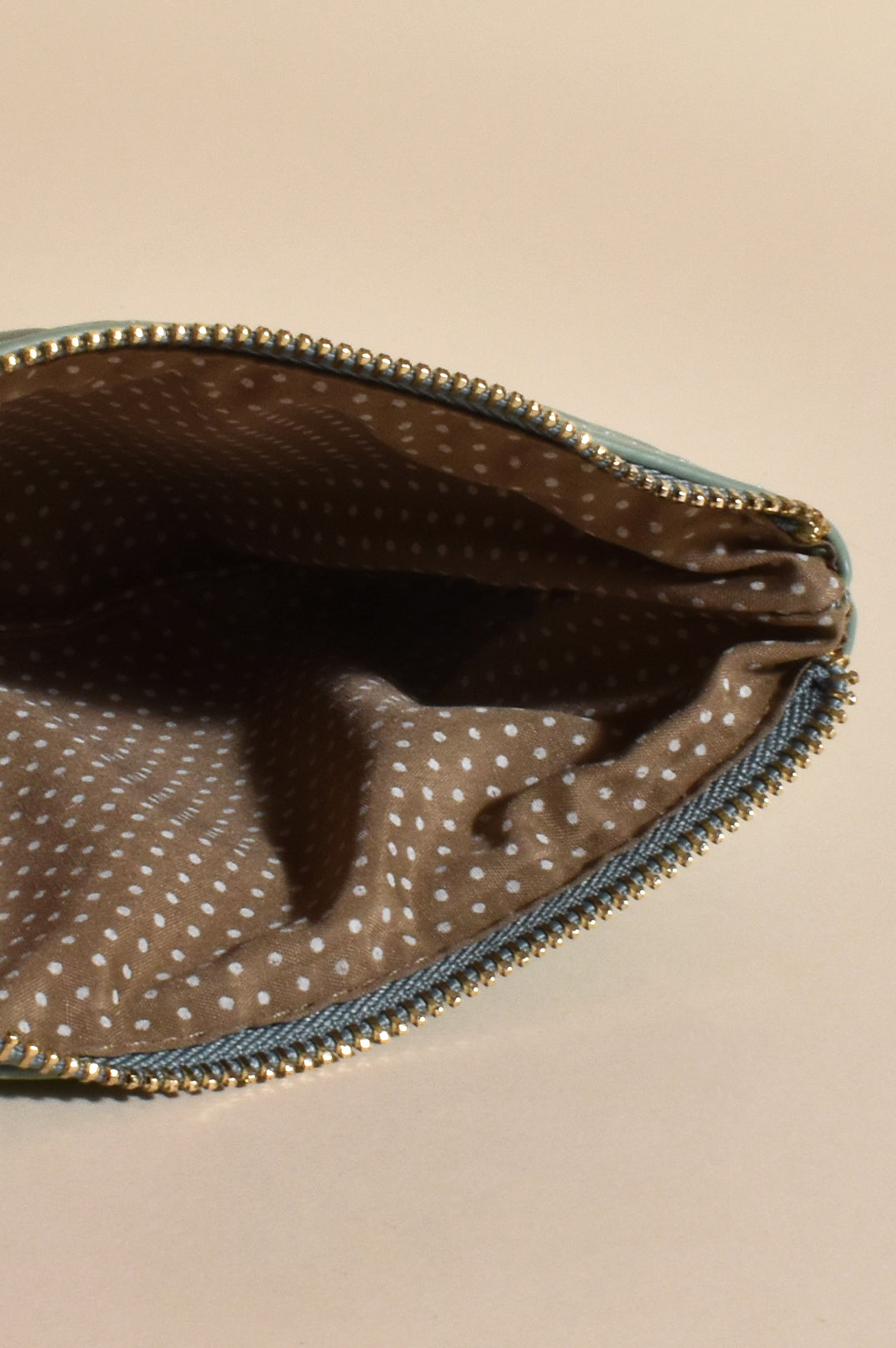 Amara Pleat Design Pouch Bag with Wrist Strap in Tan or Sage.