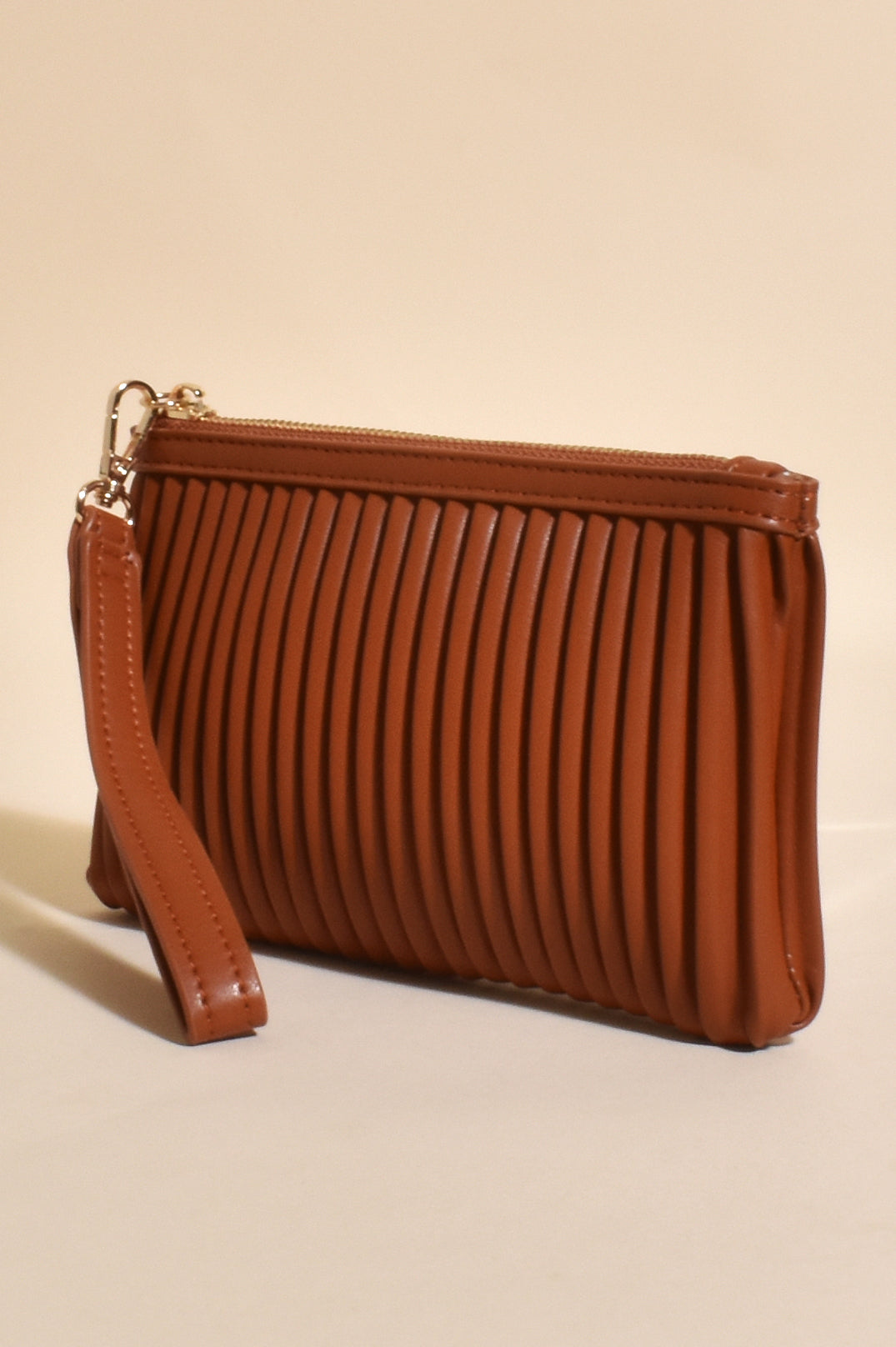 Amara Pleat Design Pouch Bag with Wrist Strap in Tan or Sage.
