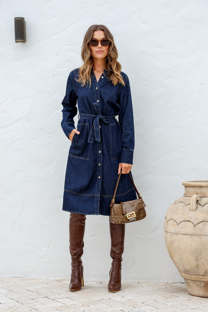 Long sleeve button up denim Dress with side pockets.