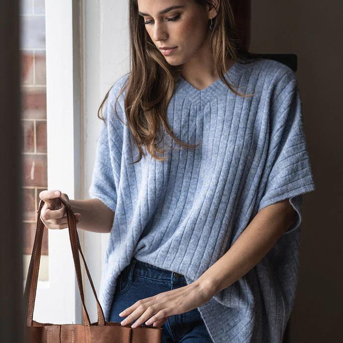 The Melina Poncho in Charcoal and Blue Mist by Humidity. A fabulous layering piece!