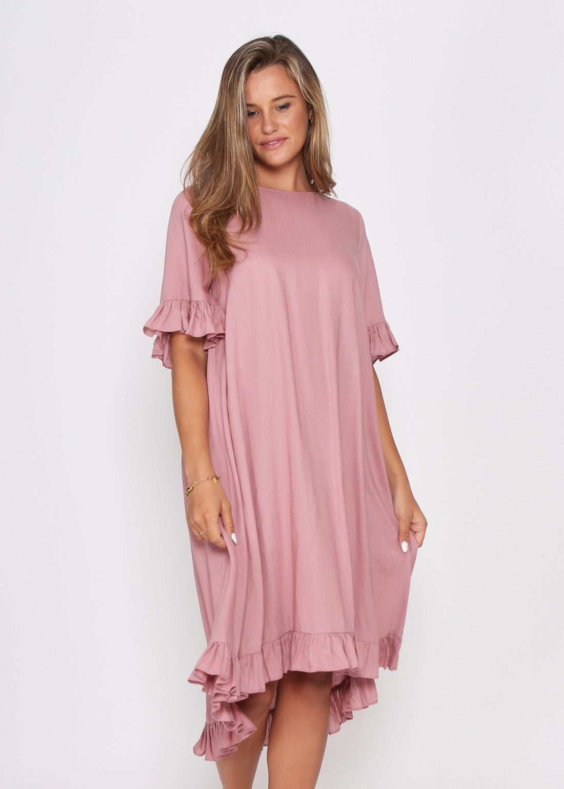 Dusky Pink Dress with pretty sleeve detail and hem line. - sammi