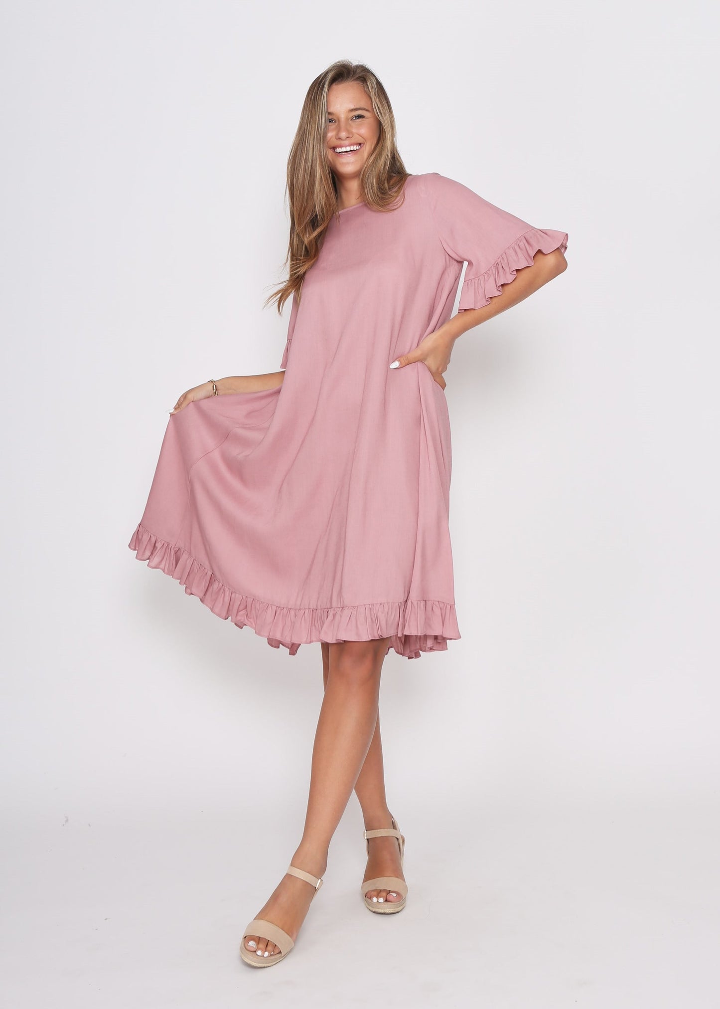 Dusky Pink Dress with pretty sleeve detail and hem line. - sammi