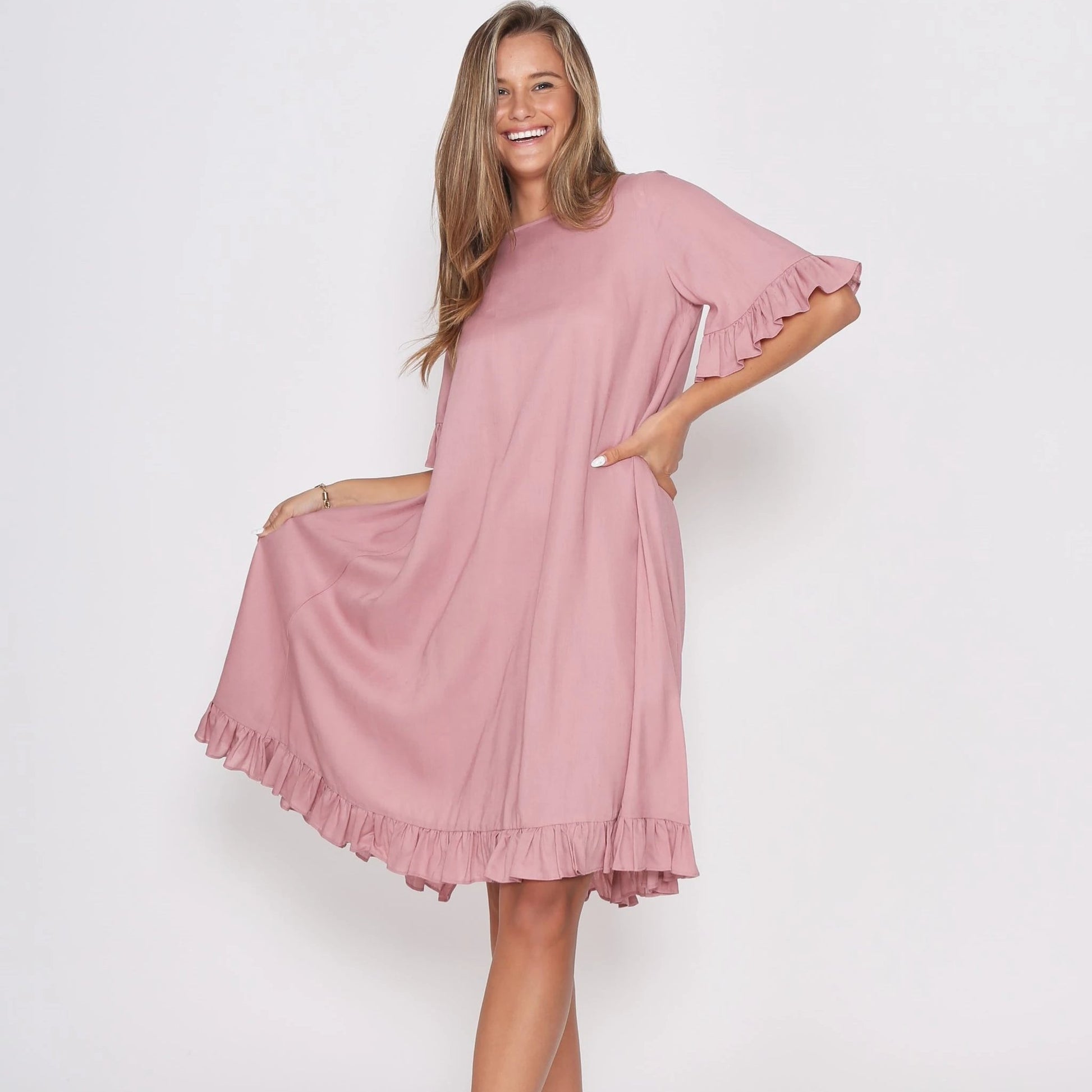 Dusky Pink Dress with pretty sleeve detail and hem line. - sammi